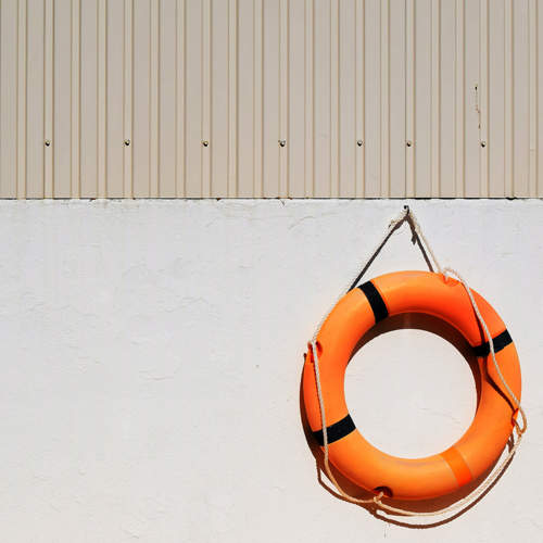 Essential Pool Tools life ring hanging on wall