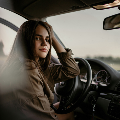 collegedriver woman in car